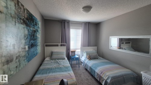 #9 804 Welsh Dr Sw, Edmonton, AB - Indoor Photo Showing Bedroom