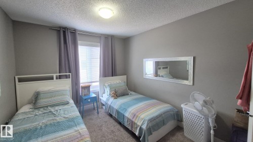 #9 804 Welsh Dr Sw, Edmonton, AB - Indoor Photo Showing Bedroom