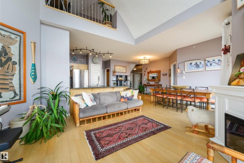 #307 9927 79 Av Nw, Edmonton, AB - Indoor Photo Showing Living Room With Fireplace