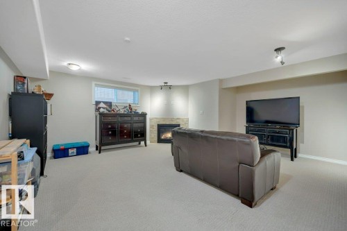 6483 Sandin Crescent Nw, Edmonton, AB - Indoor With Fireplace