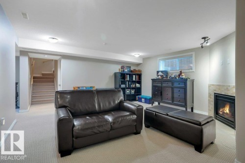 6483 Sandin Crescent Nw, Edmonton, AB - Indoor With Fireplace