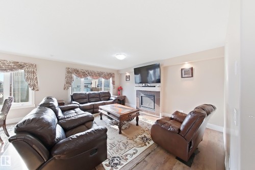 1862 32A Street Nw, Edmonton, AB - Indoor Photo Showing Living Room With Fireplace
