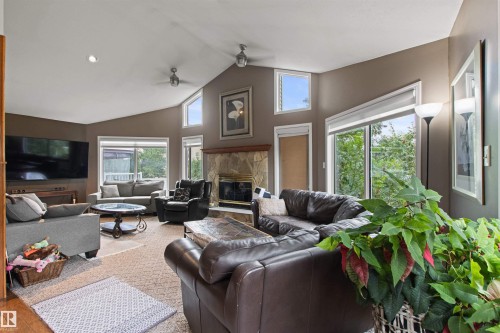 Vaulted ceiling with recessed lighting and ceiling fans - 11139 157 Avenue Nw, Edmonton, AB - Indoor Photo Showing Living Room With Fireplace
