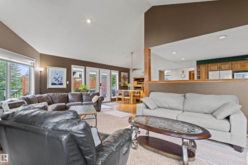 Vaulted ceilings, recessed lighting, and multiple windows with outdoor access - 11139 157 Avenue Nw, Edmonton, AB - Indoor Photo Showing Living Room