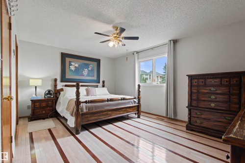 Ceiling fan with integrated lighting - 11139 157 Avenue Nw, Edmonton, AB - Indoor Photo Showing Bedroom