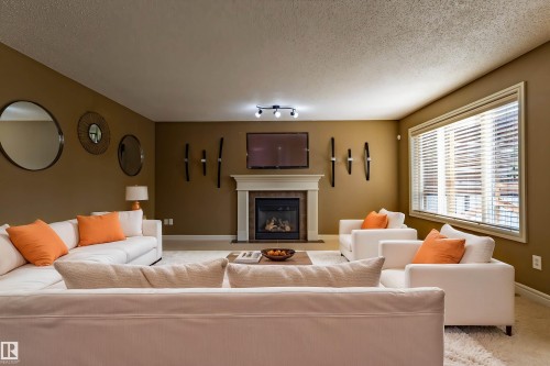 1115 117A Street Sw, Edmonton, AB - Indoor Photo Showing Living Room With Fireplace