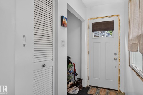 White paneled entry door with transom window - 351 Smith Crescent, Rural Parkland County, AB - Indoor Photo Showing Other Room
