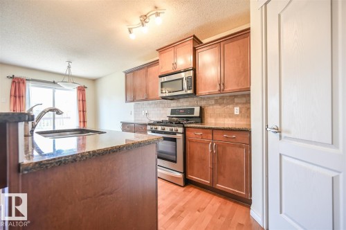 11425 14 Avenue Sw, Edmonton, AB - Indoor Photo Showing Kitchen With Stainless Steel Kitchen