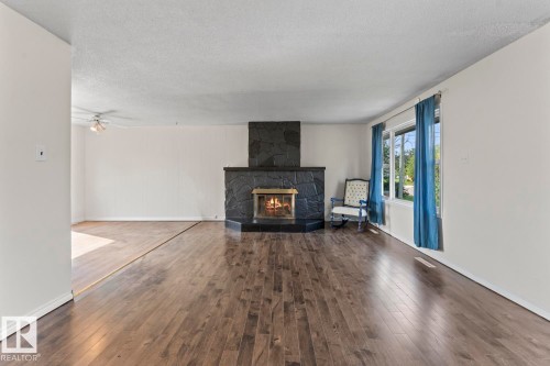 5105 58 Street, Cold Lake, AB - Indoor Photo Showing Living Room With Fireplace