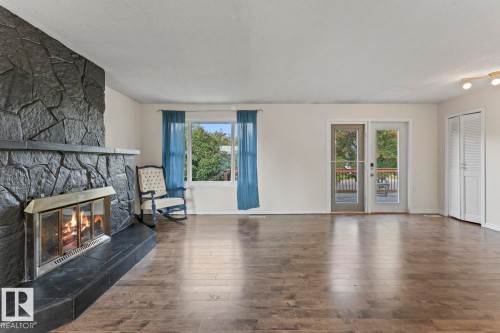 5105 58 Street, Cold Lake, AB - Indoor Photo Showing Living Room With Fireplace
