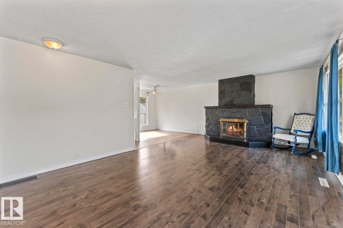 5105 58 Street, Cold Lake, AB - Indoor Photo Showing Living Room With Fireplace