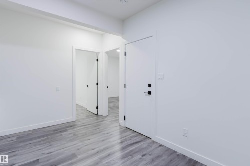 Neutral white walls - 5320 Kimball Place Sw, Edmonton, AB - Indoor Photo Showing Other Room