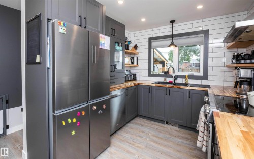 10339 108 Avenue, Westlock, AB - Indoor Photo Showing Kitchen With Double Sink