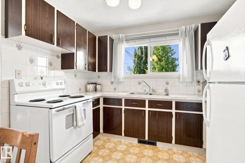 16111 88A Avenue Nw, Edmonton, AB - Indoor Photo Showing Kitchen With Double Sink