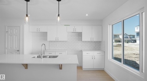110 Juniper Wynd, Fort Saskatchewan, AB - Indoor Photo Showing Kitchen With Double Sink With Upgraded Kitchen