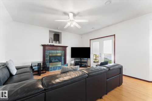 488 Klarvatten Lake Wynd Nw, Edmonton, AB - Indoor Photo Showing Living Room With Fireplace