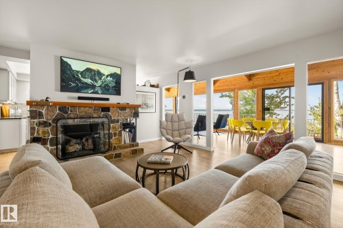 139 Silver Beach Road, Rural Wetaskiwin County, AB - Indoor Photo Showing Living Room With Fireplace