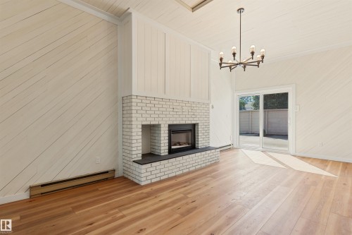 9328 168 Street Nw, Edmonton, AB - Indoor Photo Showing Living Room With Fireplace