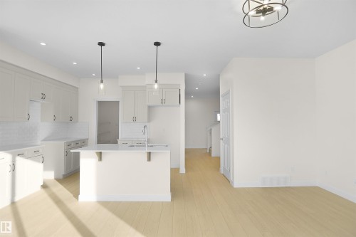 143 Ficus Way, Fort Saskatchewan, AB - Indoor Photo Showing Kitchen With Upgraded Kitchen