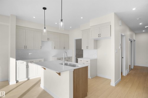 254 Elliott Wynd, Fort Saskatchewan, AB - Indoor Photo Showing Kitchen With Double Sink With Upgraded Kitchen