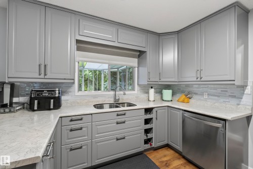 #6 25012 Sturgeon Rd, Rural Sturgeon County, AB - Indoor Photo Showing Kitchen With Double Sink With Upgraded Kitchen