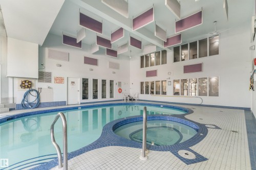 #115 18012 95 Av Nw, Edmonton, AB - Indoor Photo Showing Other Room With In Ground Pool