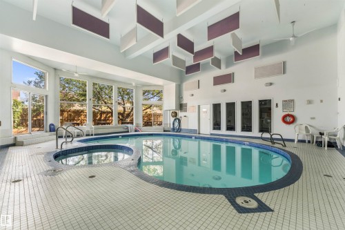 #115 18012 95 Av Nw, Edmonton, AB - Indoor Photo Showing Other Room With In Ground Pool