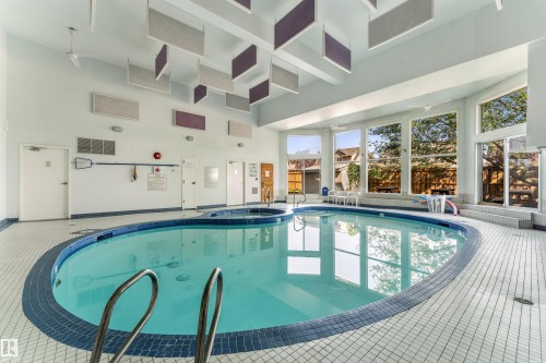 #115 18012 95 Av Nw, Edmonton, AB - Indoor Photo Showing Other Room With In Ground Pool