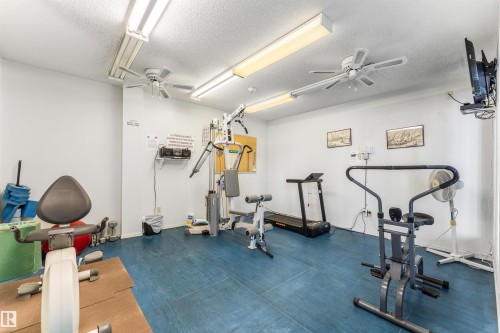 #115 18012 95 Av Nw, Edmonton, AB - Indoor Photo Showing Gym Room