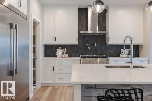 113 Stiles Bend, Leduc, AB - Indoor Photo Showing Kitchen With Upgraded Kitchen