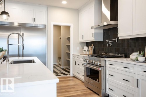 113 Stiles Bend, Leduc, AB - Indoor Photo Showing Kitchen With Upgraded Kitchen