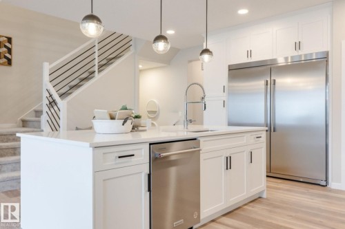 113 Stiles Bend, Leduc, AB - Indoor Photo Showing Kitchen With Upgraded Kitchen