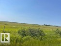 Expansive open field with natural vegetation under a clear sky - Hwy 15 & Rr 185, Rural Lamont County, AB 
