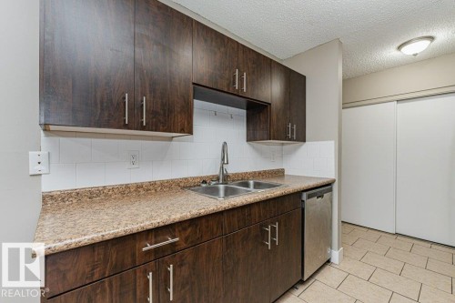 #209 14004 26 St Nw, Edmonton, AB - Indoor Photo Showing Kitchen With Double Sink
