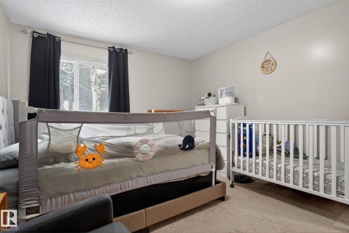 #120 5730 Riverbend Rd Nw, Edmonton, AB - Indoor Photo Showing Bedroom
