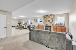 Expansive lower level featuring neutral carpeting throughout - 