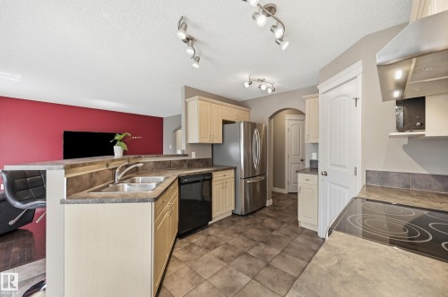 11543 11 Avenue Sw, Edmonton, AB - Indoor Photo Showing Kitchen With Double Sink