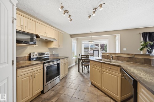 11543 11 Avenue Sw, Edmonton, AB - Indoor Photo Showing Kitchen With Double Sink