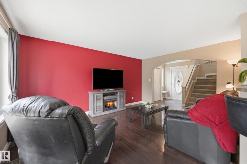 11543 11 Avenue Sw, Edmonton, AB - Indoor Photo Showing Living Room With Fireplace