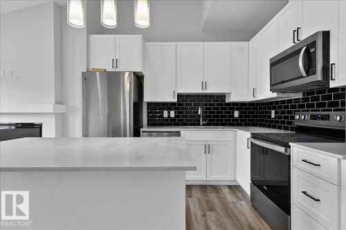 #3 2905 141 St Sw, Edmonton, AB - Indoor Photo Showing Kitchen With Stainless Steel Kitchen With Upgraded Kitchen