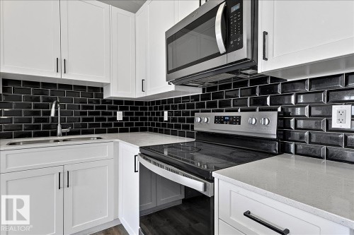 #3 2905 141 St Sw, Edmonton, AB - Indoor Photo Showing Kitchen With Upgraded Kitchen
