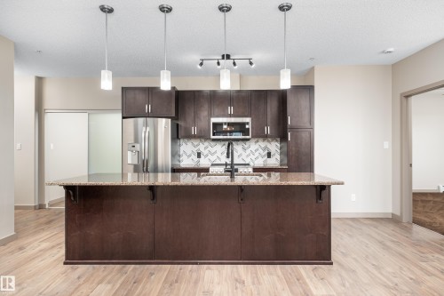 #323 320 Ambleside Link Li Sw, Edmonton, AB - Indoor Photo Showing Kitchen With Upgraded Kitchen