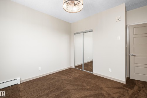 #323 320 Ambleside Link Li Sw, Edmonton, AB - Indoor Photo Showing Other Room