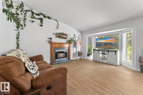 1004 12 Street, Cold Lake, AB - Indoor Photo Showing Living Room With Fireplace