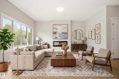 17731 7 Street Ne, Edmonton, AB - Indoor Photo Showing Living Room With Fireplace