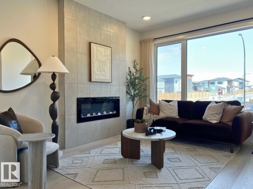 304 32 Street Sw, Edmonton, AB - Indoor Photo Showing Living Room With Fireplace