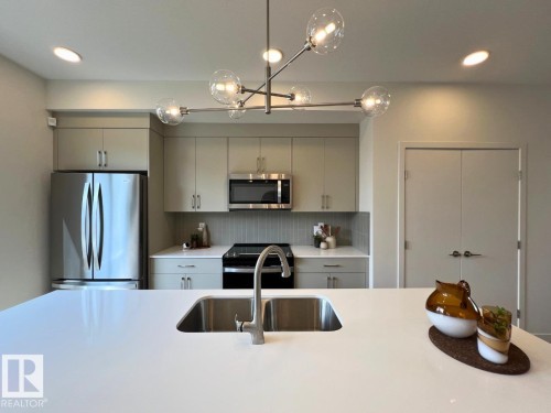 304 32 Street Sw, Edmonton, AB - Indoor Photo Showing Kitchen With Double Sink