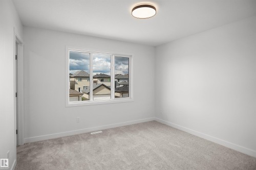 548 Ashgrove Circle, Leduc, AB - Indoor Photo Showing Other Room