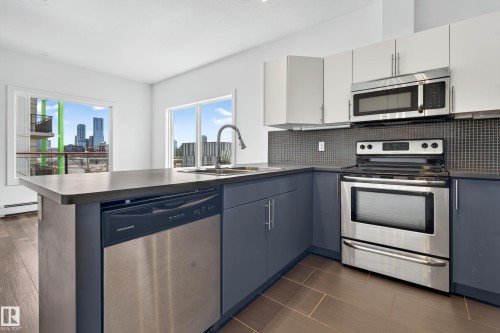 #413 10611 117 St Nw, Edmonton, AB - Indoor Photo Showing Kitchen With Stainless Steel Kitchen
