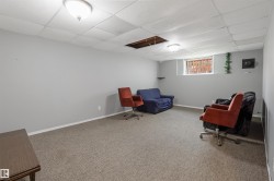 Wall-to-wall carpeting and neutral wall paint - 